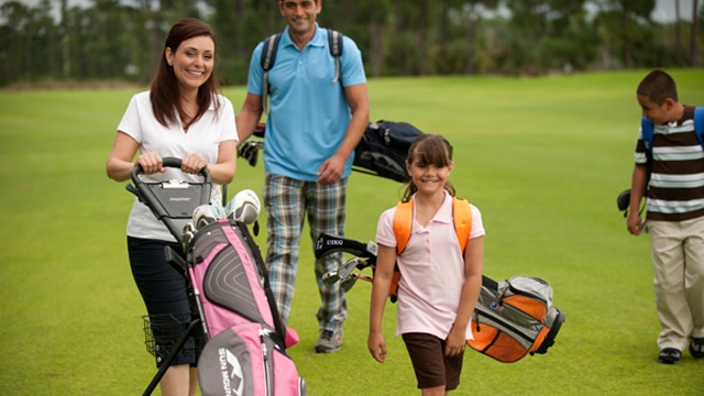 family on golf course