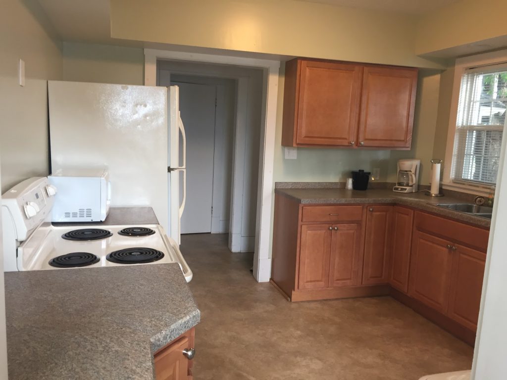 kitchen with stove and fridge