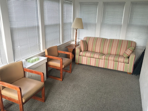 striped couch and chairs